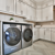 Laundry room with Glacier Oak SM-RL21 floors in a herringbone pattern on Season 2, Episode 3 of Rock The Block