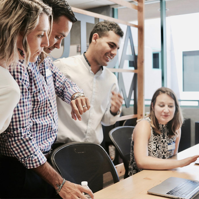 Colleagues talking in a meeting