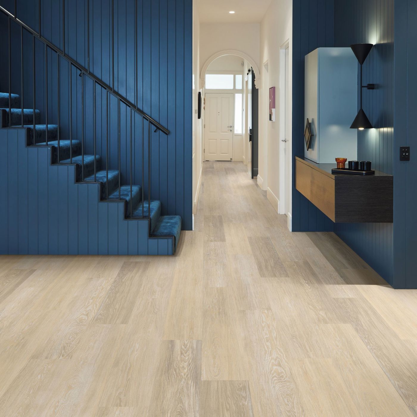 Opulent vinyl floors define a stylish and functional hallway.