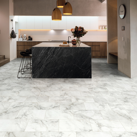 River Marble ST31 with DS12 design strips in a rose and black kitchen Knight Tile